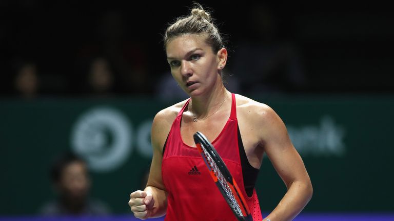 SINGAPORE - OCTOBER 23:  Simona Halep of Romania celebrates a point in her singles match against Caroline Garcia of France during day 2 of the BNP Paribas 