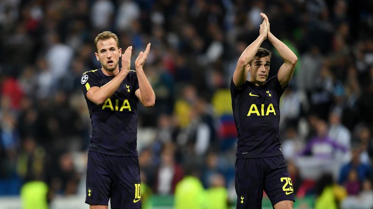 Harry Kane of Tottenham Hotspur and Harry Winks of Tottenham Hotspur show appreciation to the fans
