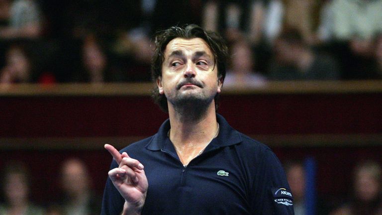 Henri Leconte of France gestures during the BlackRock Masters Tennis at the Royal Albert Hall
