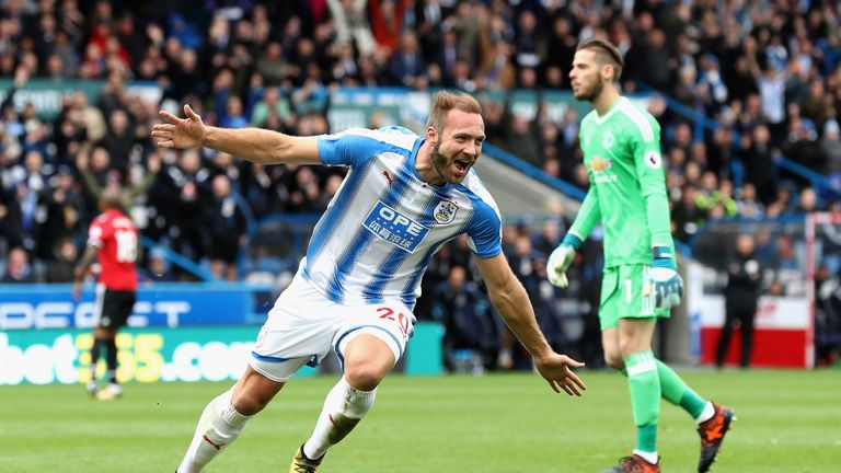 HUDDERSFIELD, ENGLAND - OCTOBER 21:  Laurent Depoitre of Huddersfield Town celebrates as he scores their second goal during the Premier League match betwee
