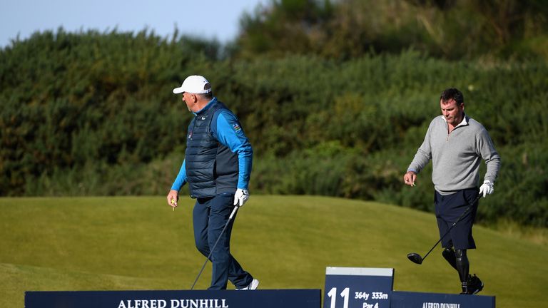 ST ANDREWS, SCOTLAND - OCTOBER 06:  Sir Ian Botham stands with Ian Bishop on the 10th during day two of the 2017 Alfred Dunhill Championship at Kingsbarns 