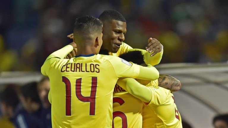 Ecuador's Romario Ibarra (covered) celebrates with teammates after scoring against Argentina during their 2018 World Cup qualifier football match in Quito,