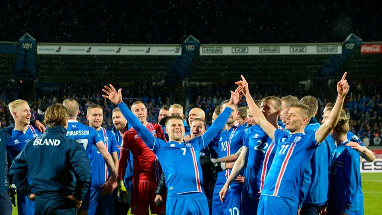Iceland's players celebrate after reaching the World Cup finals
