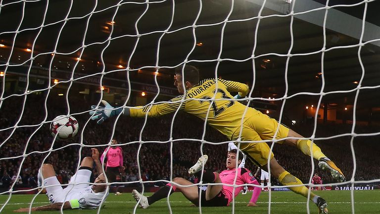 GLASGOW, SCOTLAND - OCTOBER 05: Martin Skrtel of Slovakia  scores an own goal during the FIFA 2018 World Cup Qualifier between Scotland and Slovakia at Ham