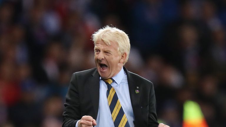 GLASGOW, SCOTLAND - OCTOBER 05:  Gordon Strachan manager of Scotland celebrates as Martin Skrtel of Slovakia scores an own goal for their first goal during