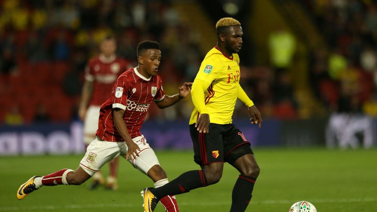 Isaac Success of Watford holds off Niclas Eliasson of Bristol City during the Carabao Cup Second Round match at Vicarage Road on August 22, 2017.