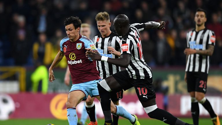 Jack Cork of Burnley is chased down by Mohamed Diame