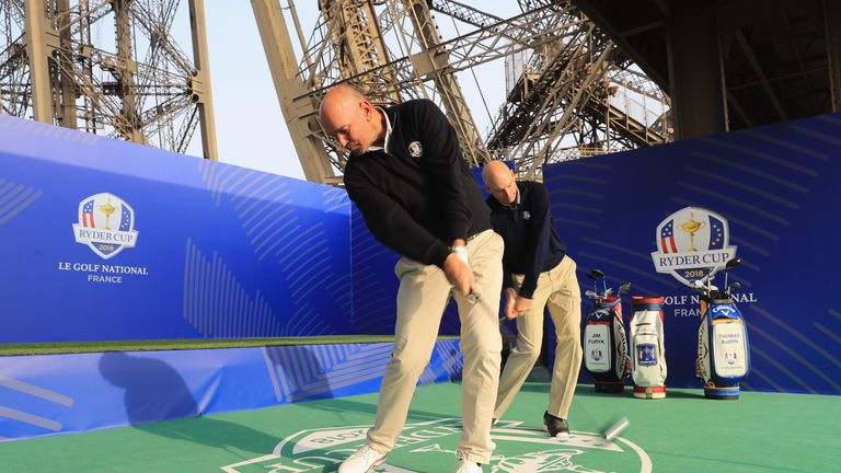 PARIS, FRANCE - OCTOBER 17:  Jim Furyk, Captain of The United States and Thomas Bjorn, Captain of Europe tee off from a platform on the Eiffel Tower during