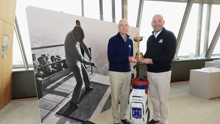 PARIS, FRANCE - OCTOBER 17: Jim Furyk of the United States, Captain of Team America (L) and Thomas Bjorn of Denmark, Captain of Team Europe (R) pose for a 