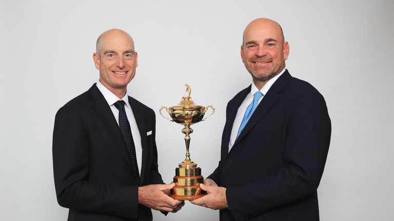 PARIS, FRANCE - OCTOBER 17:  Jim Furyk, Captain of The United States and Thomas Bjorn, Captain of Europe pose with the Ryder Cup trophy during the Ryder Cu