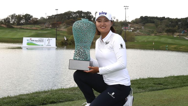 INCHEON, SOUTH KOREA - OCTOBER 15:  Jin-Young Ko of South Korea lifts the winners trophy during a ceremony following the LPGA KEB Hana Bank Championship at