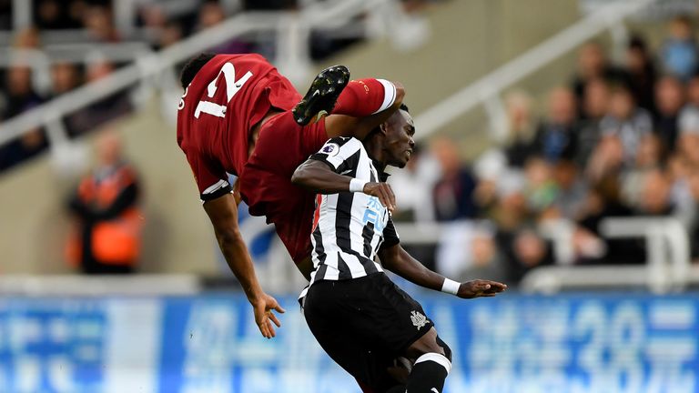 Joe Gomez catches Christian Atsu with a high boot during the Premier League match at St James' Park
