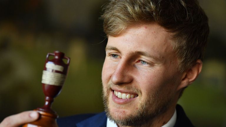 England captain Joe Root gestures as he displays the Ashes urn ahead of the England cricket team's departure to Australia for the Ashes tour, at Lord's Cri