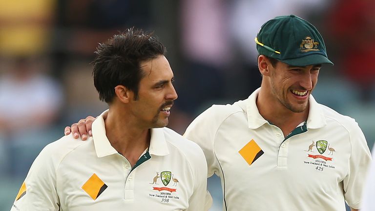 PERTH, AUSTRALIA - NOVEMBER 17:  Mitchell Johnson of Australia is acknowledged by Mitchell Starc as he prepares to bowl during day five of the second Test 