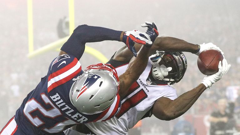 FOXBORO, MA - OCTOBER 22: Julio Jones #11 of the Atlanta Falcons catches a touchdown pass as he is defended by Malcolm Butler #21 of the New England Patrio