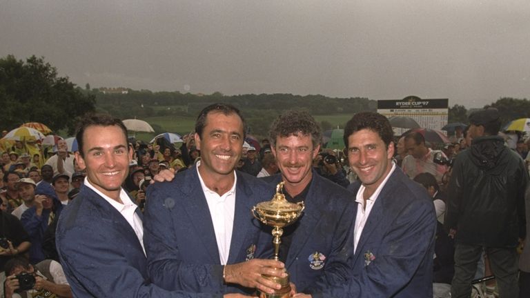 Ignacio Garrido, captain Seve Ballesteros, his assistant Miguel Jimenez and Jose Maria Olazabal celebrate with the Ryder Cup in 1997