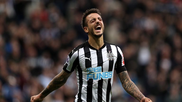 Joselu of Newcastle United celebrates scoring his side's first goal during the Premier League match v Liverpool