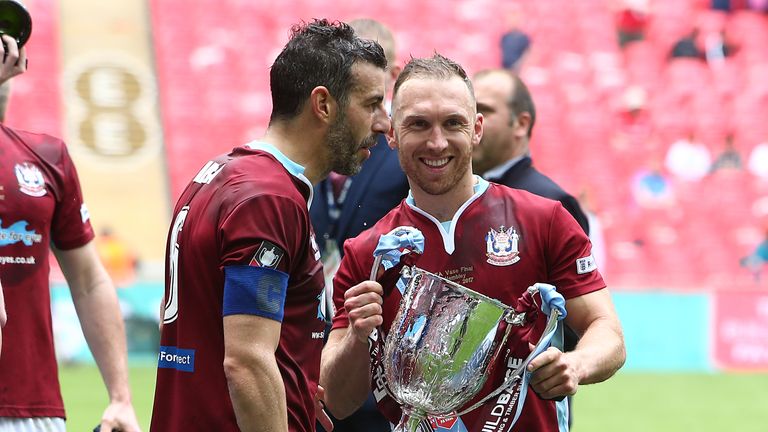 LONDON, ENGLAND - MAY 21: David Foley and Julio Arca celebrate victory at the end of The Buildbase FA Vase Final between South Shields and Cleethorpes Town