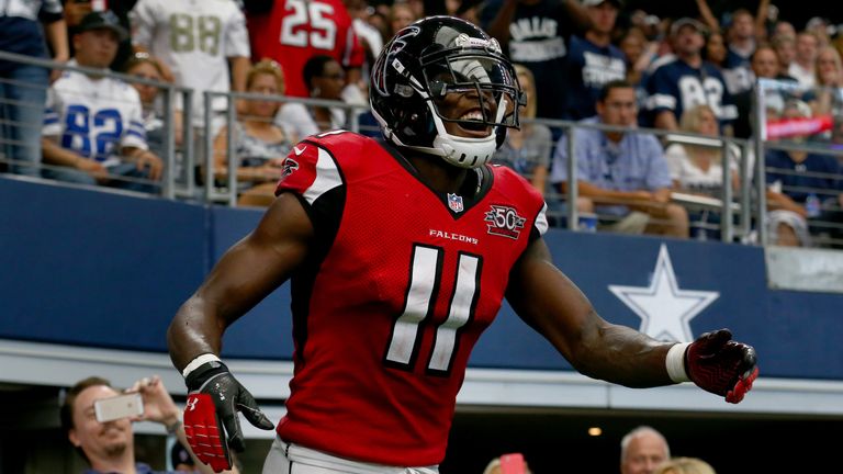 ARLINGTON, TX - SEPTEMBER 27: Julio Jones #11 of the Atlanta Falcons smiles after scoring on a touchdown pass against the Dallas Cowboys in the fourth quar