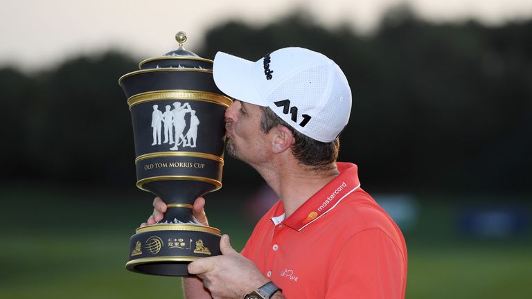 SHANGHAI, CHINA - OCTOBER 29:  Justin Rose of England celebrates with the winners trophy after the final round of the WGC - HSBC Champions at Sheshan Inter