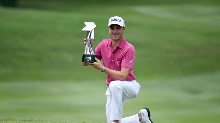 KUALA LUMPUR, MALAYSIA - OCTOBER 23:  Justin Thomas of the United States poses with the CIMB Classic Trophy after he won it by under 23 265 during day four