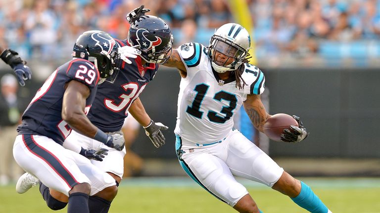 CHARLOTTE, NC - AUGUST 09:  Kelvin Benjamin #13 of the Carolina Panthers makes a catch against Andre Hal #29 and Kevin Johnson #30 of the Houston Texans du