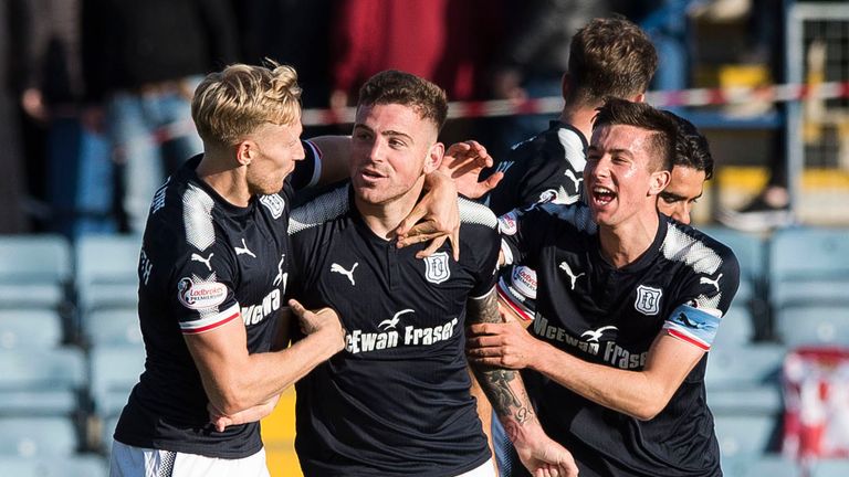 Dundee's Kerr Waddell (centre) celebrates his second goal against Hearts