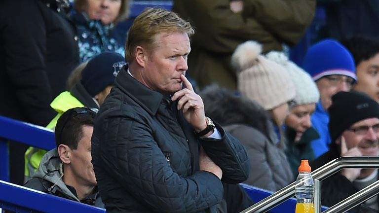 Everton's Dutch manager Ronald Koeman looks on after Arsenal score their fourth goal during the English Premier League football match between Everton and A