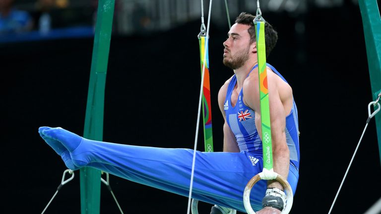 Kristian Thomas of Great Britain competes on the rings in the Artistic Gymnastics Men's Team at the Rio Olympics