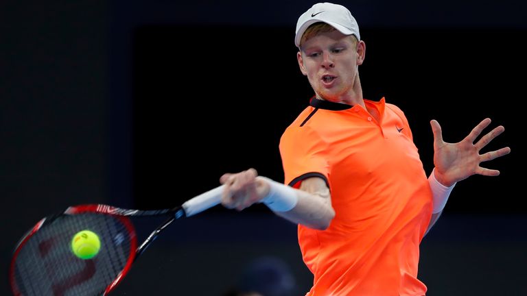 BEIJING, CHINA - OCTOBER 07:  Kyle Edmund of Great Britain returns a shot against Andy Murray of Great Britain during the Men's Singles Quarterfinals match