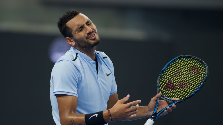 Nick Kyrgios of Australia argues with the referee during his men's singles final match against Rafael Nadal of Spain at the China Open tennis tournament in