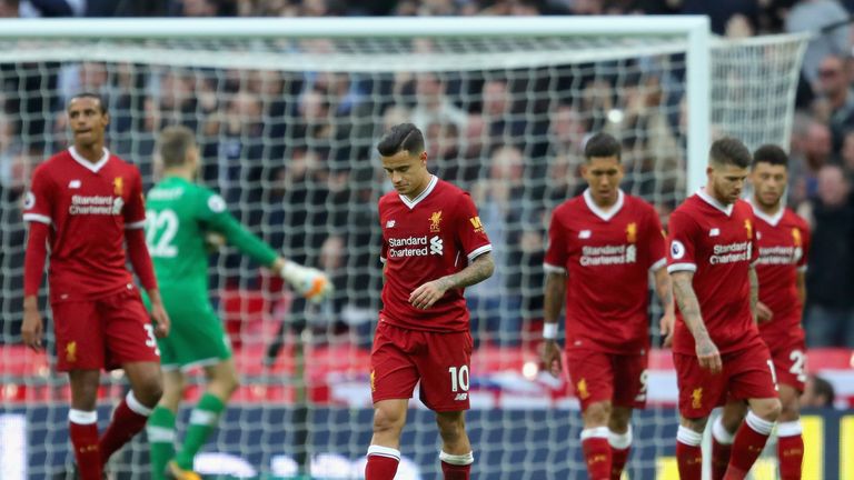 LONDON, ENGLAND - OCTOBER 22: Philippe Coutinho of Liverpool and his Liverpool team mates are dejected after Tottenham Hotspur fourth goal during the Premi