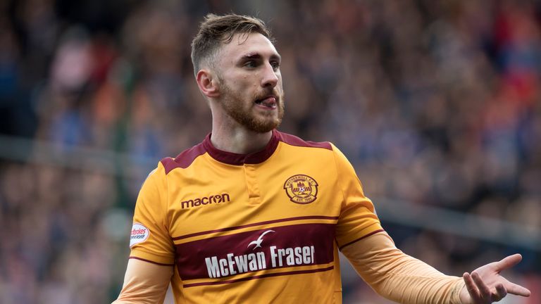 Motherwell's Louis Moult  celebrates his second goal at Hampden