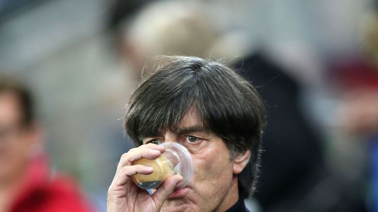 Germany's coach Joachim Low insisted his players would not be celebrating in Belfast after World Cup qualification