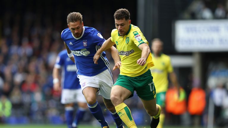 Luke Chambers of Ipswich and Yanic Wildschut of Norwich City battle for possession