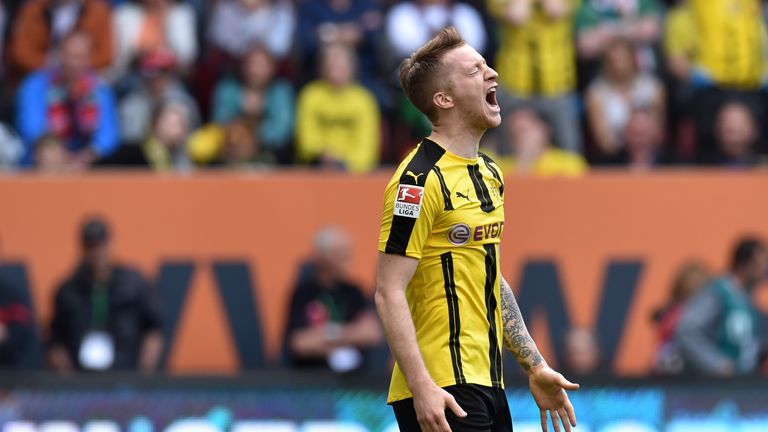 Dortmund's midfielder Marco Reus reacts after a chance during the German first division Bundesliga football match between FC Augsburg and Borussia Dortmund