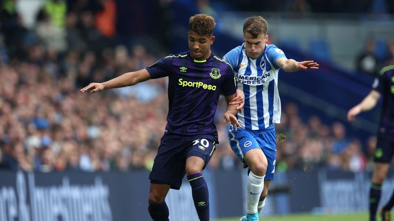 BRIGHTON, ENGLAND - OCTOBER 15: Mason Holgate of Everton and Solly March of Brighton and Hove Albion during the Premier League match between Brighton and H