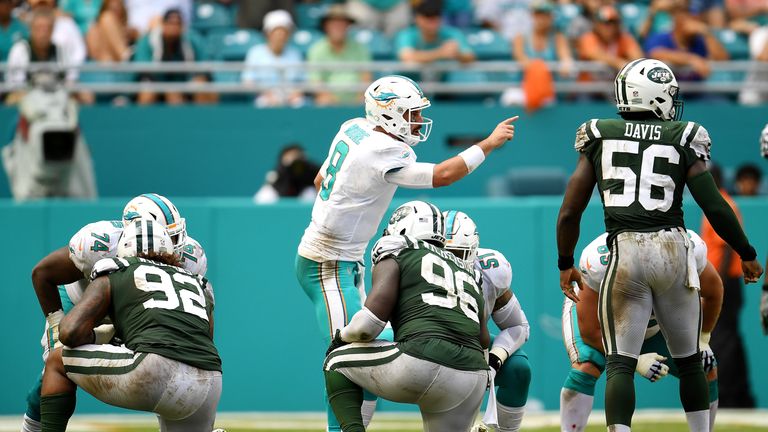 MIAMI GARDENS, FL - OCTOBER 22: Matt Moore #8 of the Miami Dolphins calls a play during the third quarter against the New York Jets at Hard Rock Stadium on