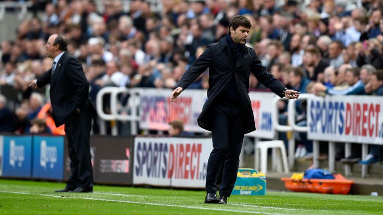 NEWCASTLE UPON TYNE, ENGLAND - MAY 15:  Tottenham manager Mauricio Pochettino reacts as manager Rafa Benitez (l) looks on during the Premier League match b