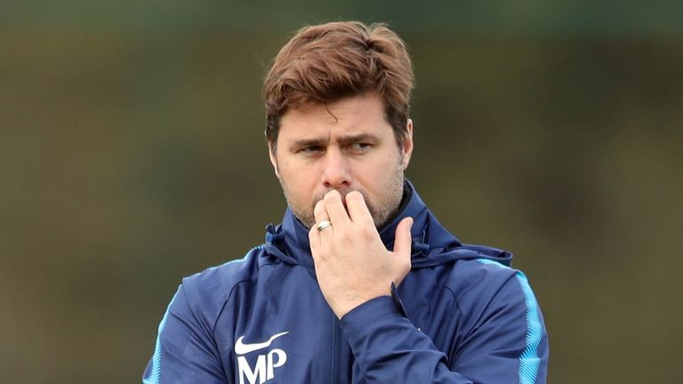 Mauricio Pochettino appears deep in thought during a training session at Tottenham's Enfield Training Centre