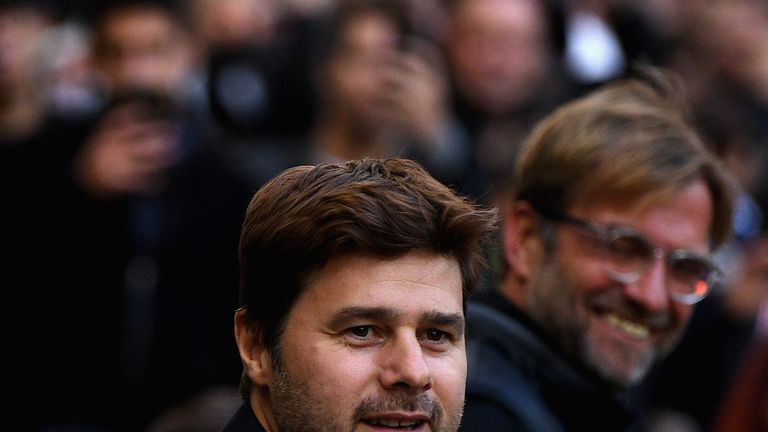 LONDON, ENGLAND - OCTOBER 22:  Mauricio Pochettino, Manager of Tottenham Hotspur and Jurgen Klopp, Manager of Liverpool embrace prior to the Premier League