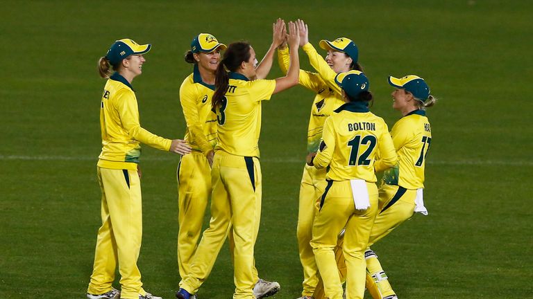 Australia's Megan Schutt  celebrates taking the wicket of Tammy Beaumontduring the Women's One Day International ma