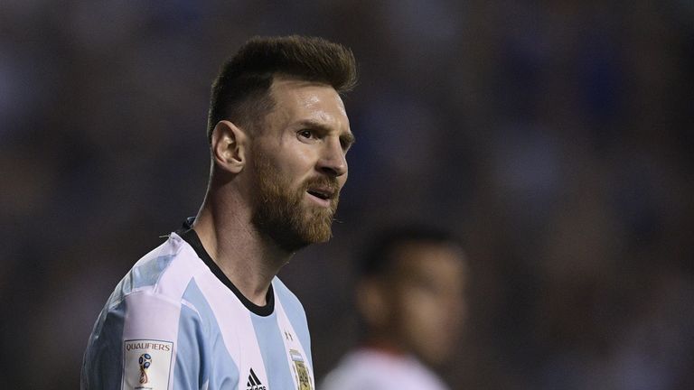 Argentina's Lionel Messi looks on during the 2018 World Cup qualifier football match against Peru in Buenos Aires on October 5, 2017. / AFP PHOTO / Juan MA