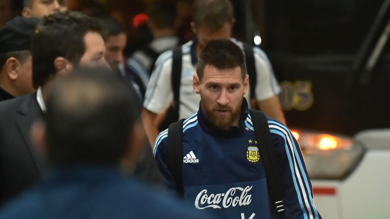 Argentina's Lionel Messi walks upon arrival at a hotel