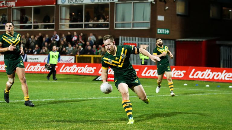 Michael Morgan scores a try as Australia defeat Scotland 54-12 in the 2016 Four Nations