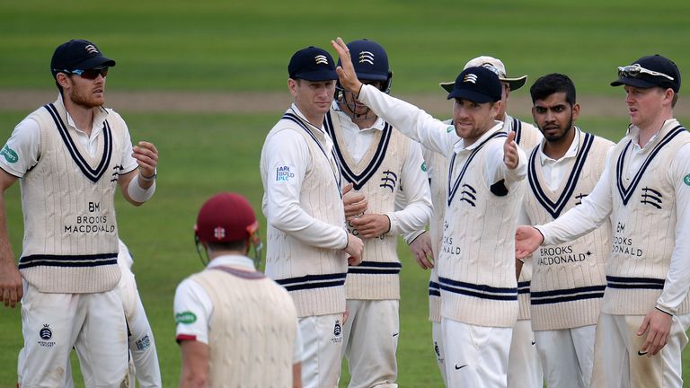 TAUNTON, ENGLAND - SEPTEMBER 25: The Middlesex team react as James Hildreth(bottom) of Somerset is given not out to a decision during Day One of the Specsa