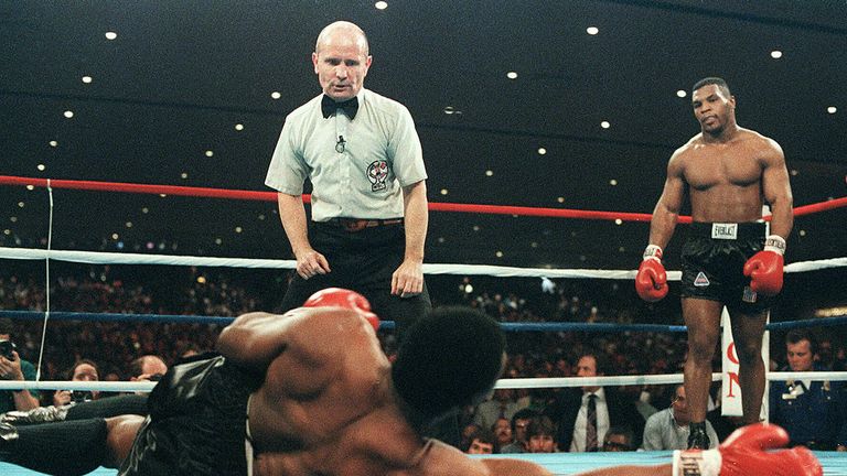  A file picture taken 22 November 1986 in Las Vegas shows Mike Tyson (R) during his fight against heavyweight champion Trevor Berbick.