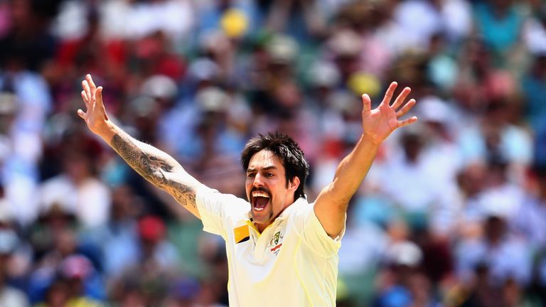 MELBOURNE, AUSTRALIA - DECEMBER 28: Mitchell Johnson of Australia celebrates after taking the wicket of Alastair Cook of England