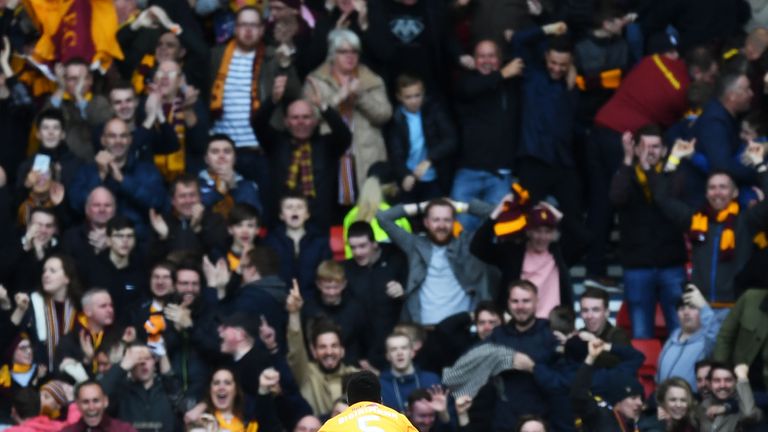 Motherwell celebrate the second goal in front of their ecstatic supporters