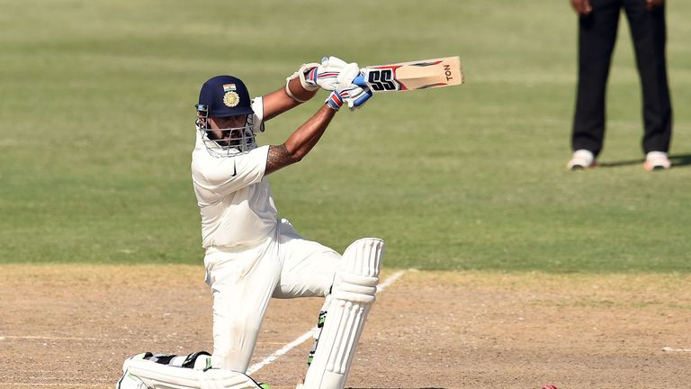 Indian cricketer Murali Vijay hits a boundary during the three-day tour match between India and WICB President's XI squad at the Warner Park stadium in Bas